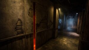 A realistic editorial image of a haunted attraction hallway with a concealed scare door blended into distressed wall panels.