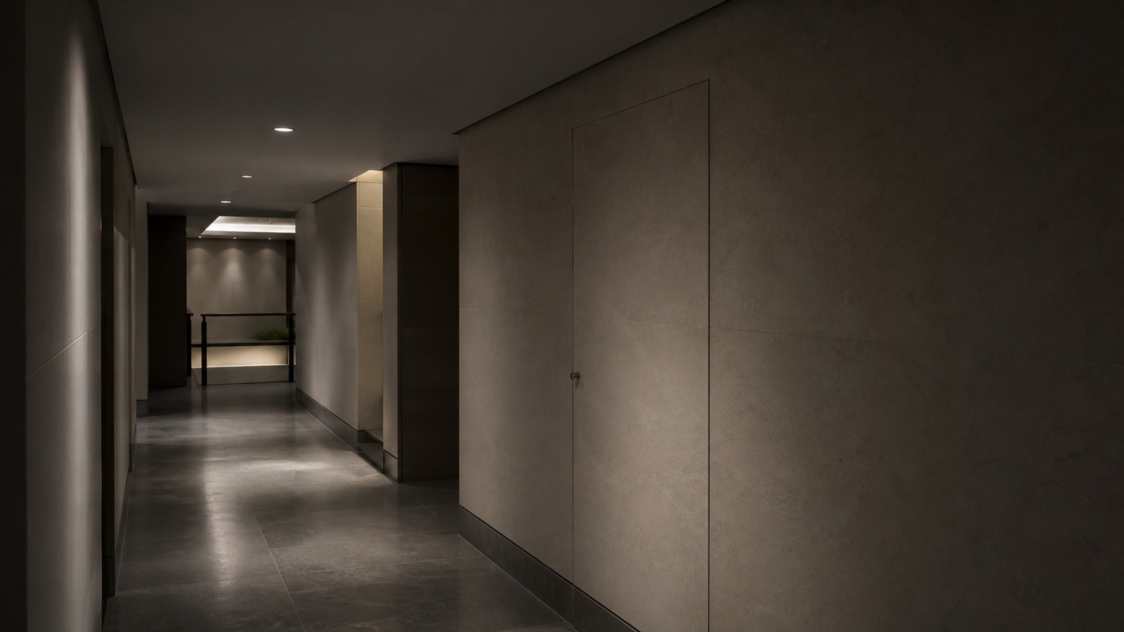 A realistic editorial image of a discreet secure corridor entrance inside a restrained intelligence-office setting.